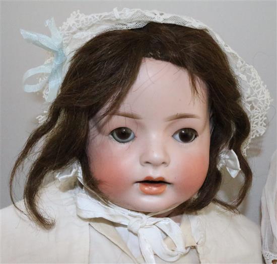 A Simon & Halbig No.7 Hanna bisque head doll & a similar doll